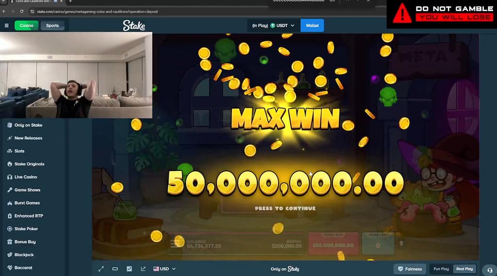 rainwreckstv reacts with hands behind his head as a MAX WIN screen displays 50,000,000.00 on Coins and Cauldrons at Stake.com