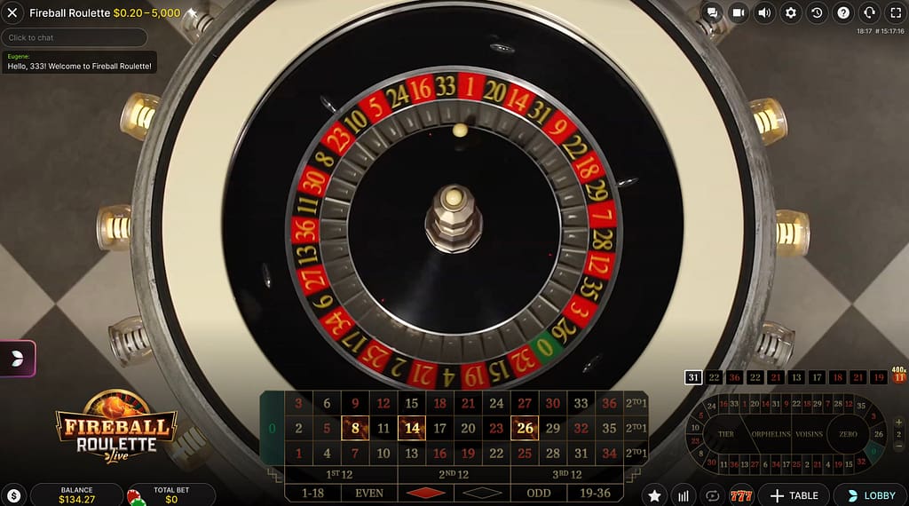 Fireball Roulette live wheel by Evolution Gaming showing the betting grid and racetrack during an active spin