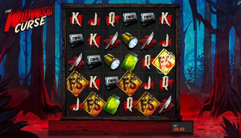 The Wildwood Curse slot base game showing multiple FS scatter symbols on the reels with horror-themed symbols including knives, cassette tapes, flashlights, and cursed character cards