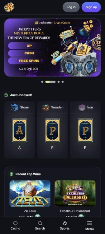 Jackpotter casino mobile homepage showing mystery boxes promotion banner with XP, cash and free spins rewards, plus recently opened letter cards from Stone, Wooden and Iron tier boxes