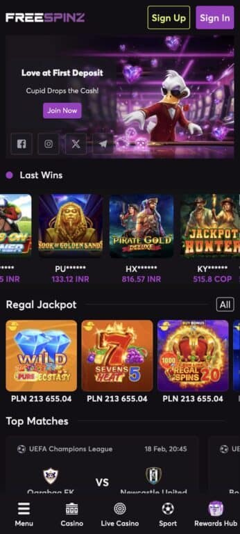 FreeSpinz casino mobile homepage showing the Valentine's Day Cupid promotion banner, Last Wins feed, Regal Jackpot section with PLN 213,655 jackpot, and Top Matches sportsbook section with UEFA Champions League
