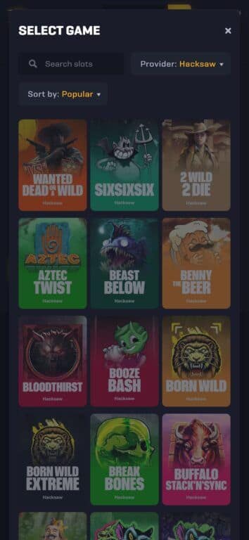 Rollbit bonus battles game selection screen showing popular Hacksaw Gaming slots including Wanted Dead or a Wild, SixSixSix, 2 Wild 2 Die, and other titles available for battle mode
