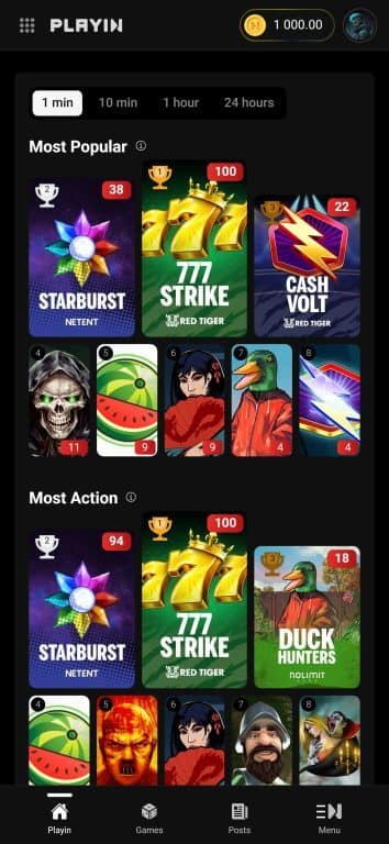 Playin.com mobile interface showing Most Popular and Most Action game rankings with 1 min timeframe selected, displaying games like Starburst (38/94), 777 Strike (100/100), and Cash Volt (22) with their popularity scores, plus user balance of 1,000.00 coins