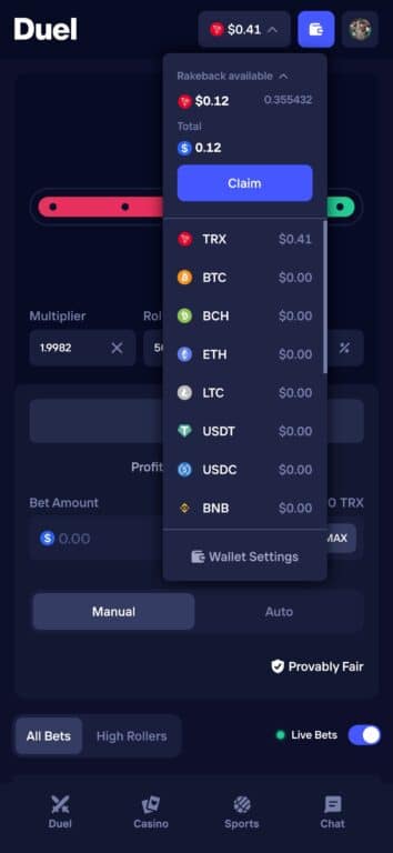 Duel casino interface showing $0.12 rakeback available to claim instantly with multi-currency wallet balances displayed