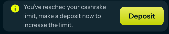 Spartans Casino notification banner stating "You've reached your cashrake limit, make a deposit now to increase the limit" with yellow deposit button